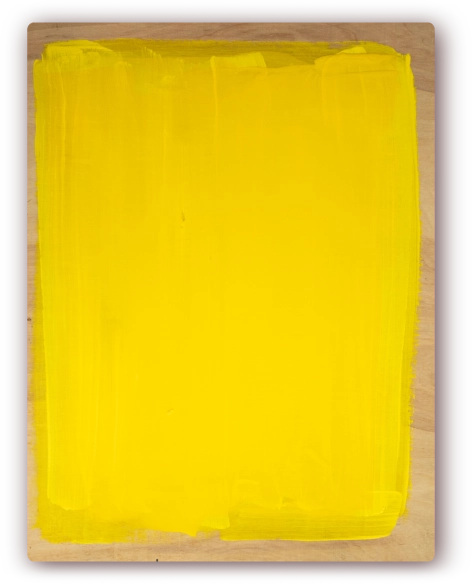 Decorative piece of light wood with yellow paint