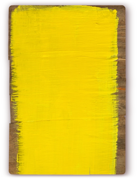 Decorative tall piece of wood with yellow paint